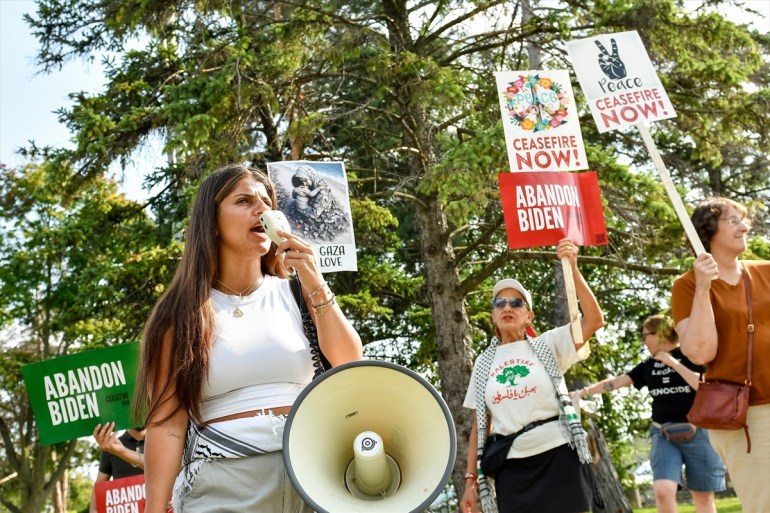 DETROIT, MICHIGAN, UNITED STATES - JULY 12: A few dozen pro-Palestinian activists gather outside the A. Phillip Randolph Vocational Technical Center in Detroit, Michigan on July 12, 2024 to protest the Biden administration’s support for Israeli attacks on Gaza and express concerns over his age and cognitive decline to attendees entering the Biden campaign rally. Photos Adam J. Dewey