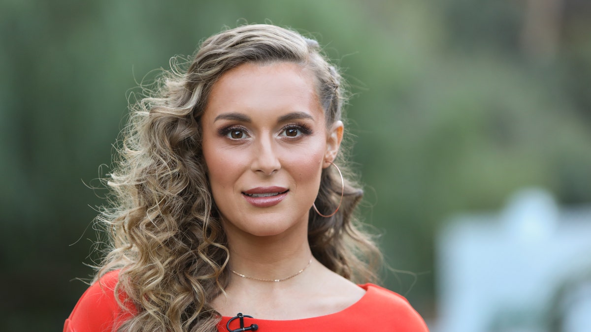 Close up of Alexa PenaVega in red dress