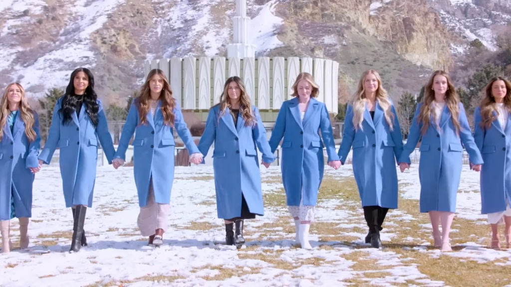 The titular wives join hands in the promo for Hulu's The Secret Wives of Mormon Wives.