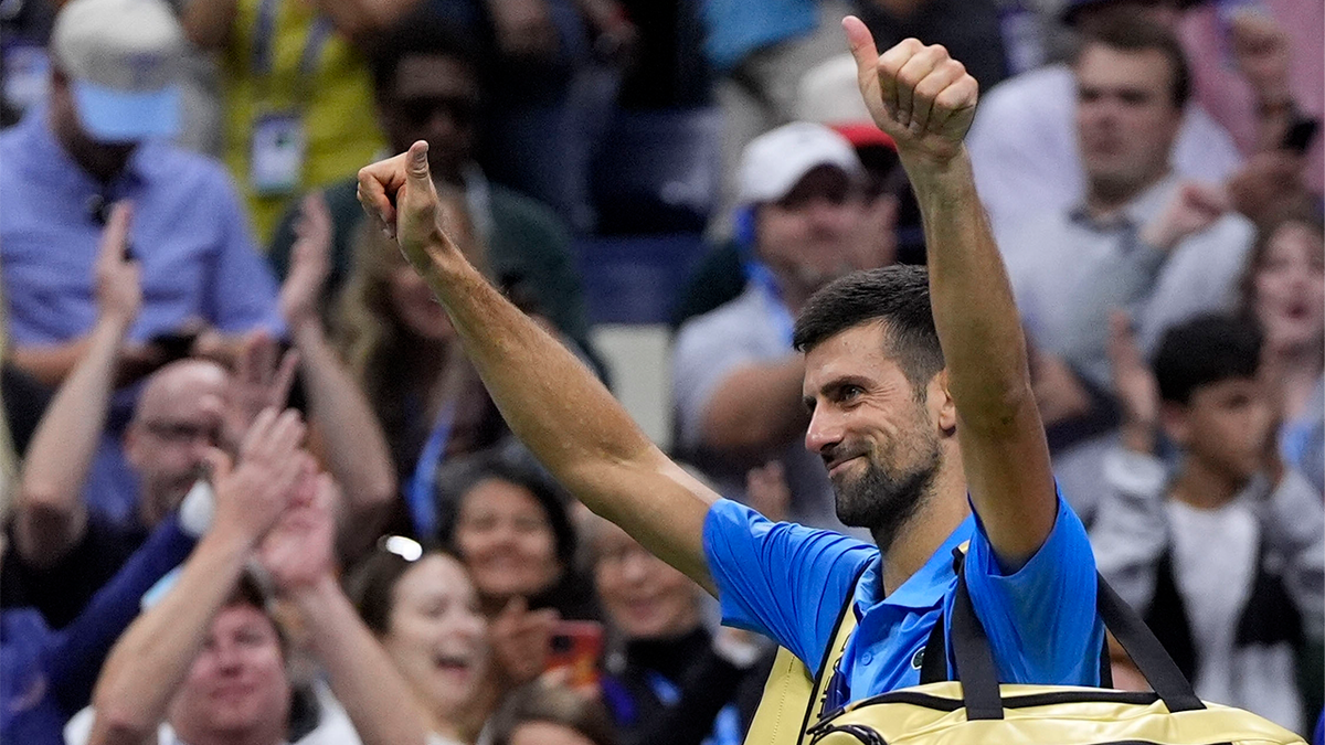 Novak Djokovic, of Serbia, reacts against Alexei Popyrin, of Australia, during a third round match of the U.S. Open tennis championships, Friday, Aug. 30, 2024, in New York.