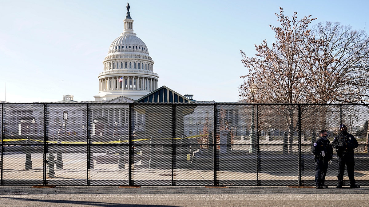 Police outside Capitol fence