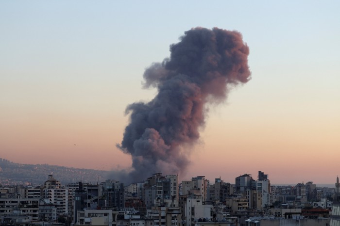 Smoke rises after what Hizbollah’s Al-Manar TV said was an Israeli strike on Beirut’s southern suburbs