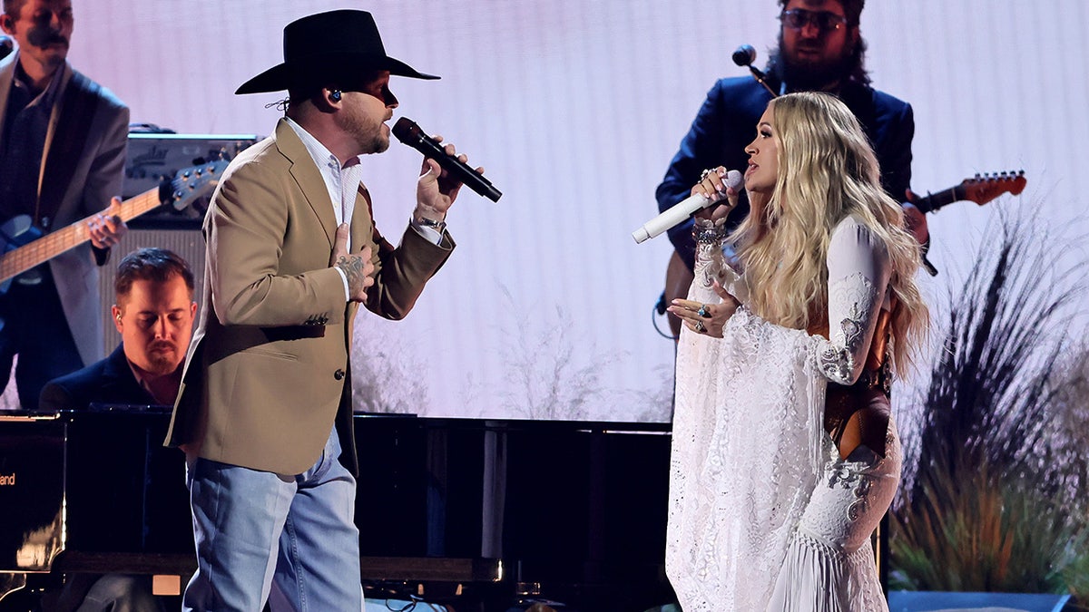 Cody Johnson and Carrie Underwood performing at the 2024 CMA Awards