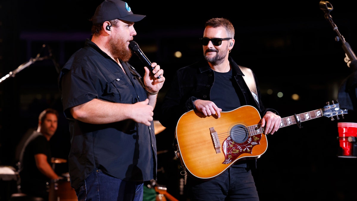 Luke Combs and Eric Church performing at concert for Hurricane Helene victims