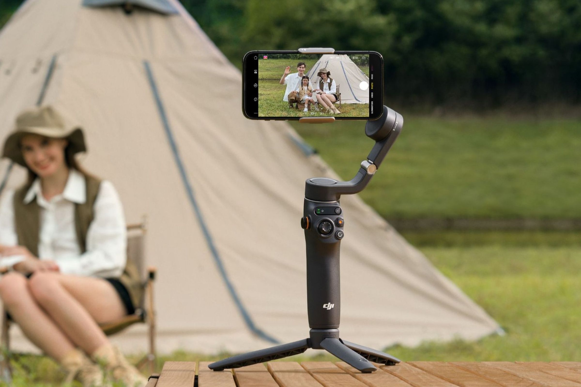 Photo of DJI Osmo Mobile 6 and smartphone on table