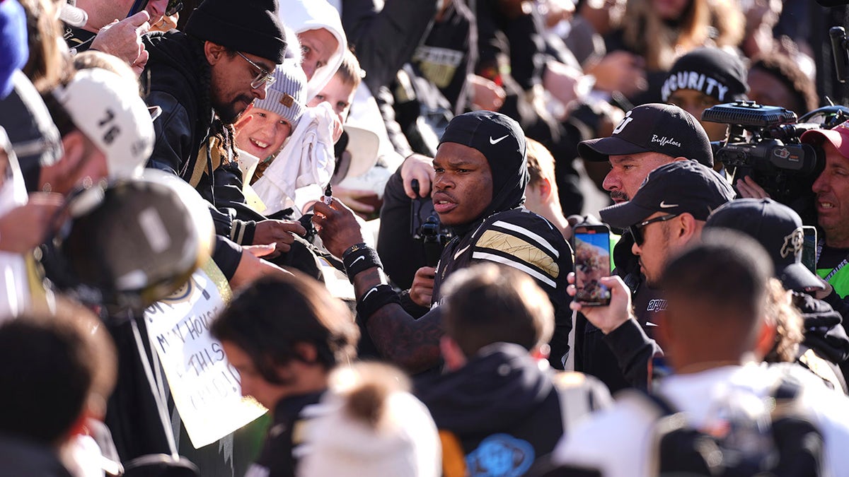 Travis Hunter with fans