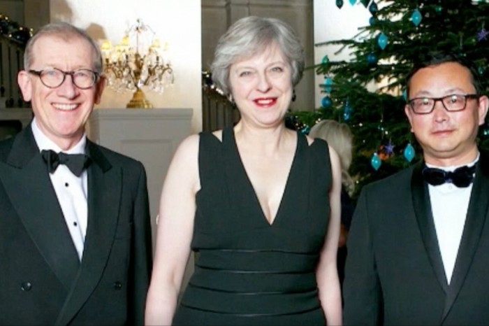 Tengbo Yang with Theresa May and her husband Philp