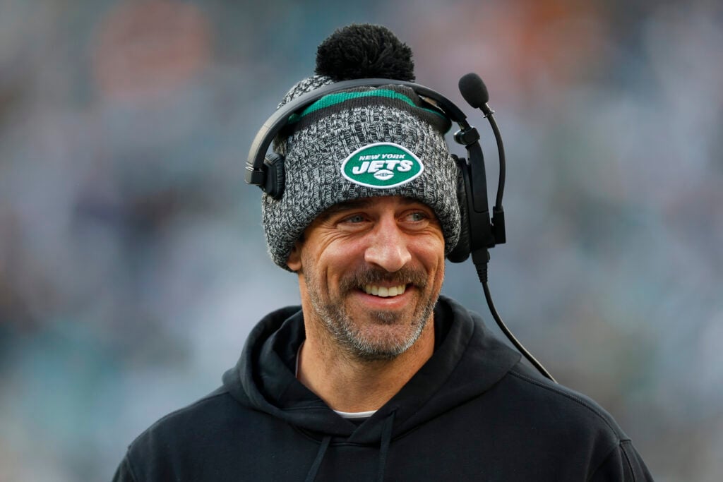 Aaron Rodgers #8 of the New York Jets looks on from the sideline prior to the game against the Miami Dolphins at MetLife Stadium on November 24, 2023 in East Rutherford, New Jersey.