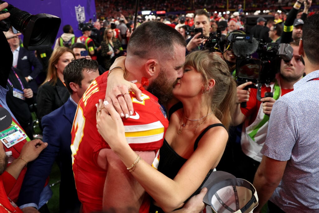 Travis Kelce #87 of the Kansas City Chiefs and Taylor Swift embrace after defeating the San Francisco 49ers in overtime during Super Bowl LVIII at Allegiant Stadium on February 11, 2024 in Las Vegas, Nevada. 