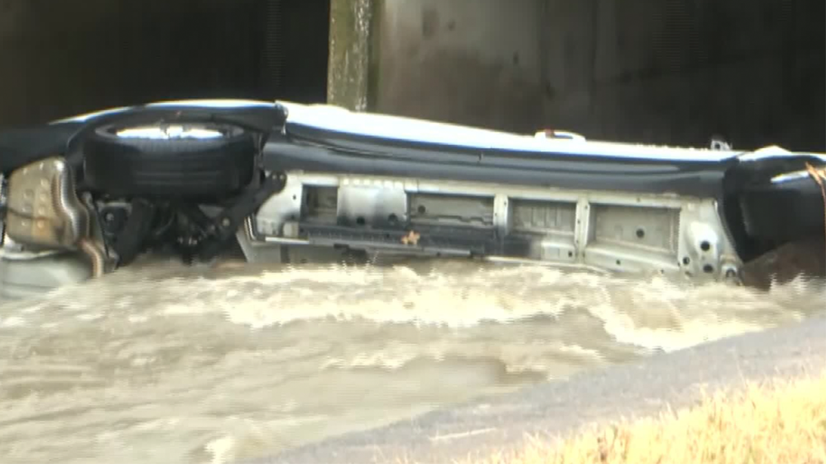 Car overturned in floodwater