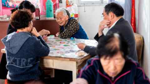 Elderly villagers playing cars in Rudong, China