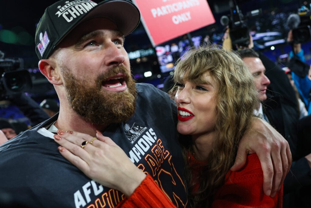 Travis Kelce of the Kansas City Chiefs celebrates with Taylor Swift after defeating the Baltimore Ravens in the AFC Championship Game at M&T Bank Stadium on January 28, 2024 in Baltimore, Maryland. 