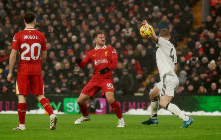 Manchester United’s Matthijs de Ligt concedes a penalty ahead of Liverpool’s second goal [Phil Noble/Reuters]