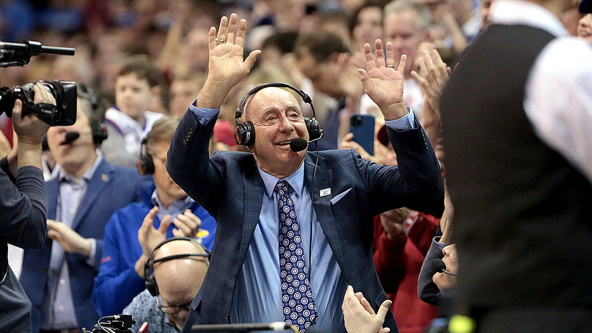 ESPN analysts Dick Vitale waves