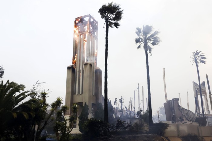 The steeple of a church burns as a result of the Palisades wildfire in Pacific Palisades 