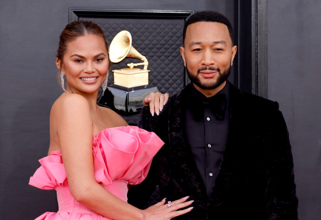 Chrissy Teigen and John Legend attend the 64th Annual GRAMMY Awards at MGM Grand Garden Arena on April 03, 2022 in Las Vegas, Nevada.