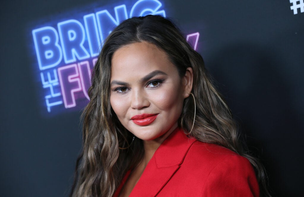 Chrissy Teigen attends the premiere of NBC's "Bring The Funny" at Rockwell Table & Stage on June 26, 2019 in Los Angeles, California.