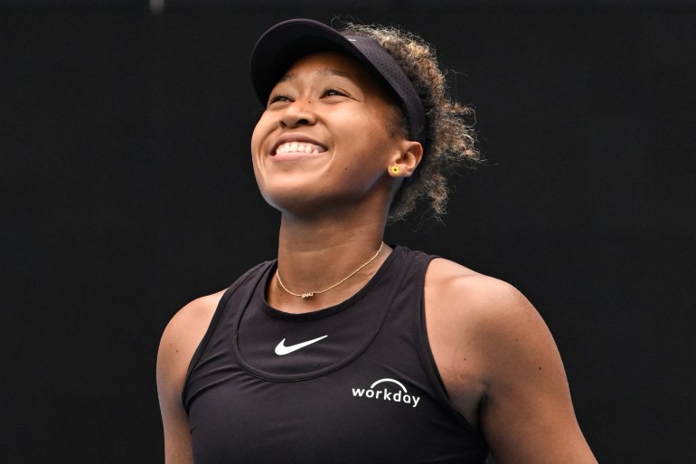 Japan's Naomi Osaka celebrates after victory against Czech Republic's Karolina Muchova during their women's singles match on day four of the Australian Open tennis tournament in Melbourne on January 15, 2025. (Photo by Paul Crock / AFP) / -- IMAGE RESTRICTED TO EDITORIAL USE - STRICTLY NO COMMERCIAL USE --