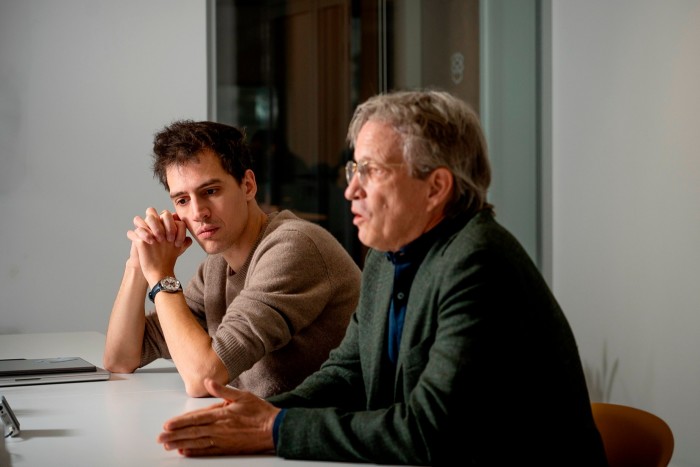 AFP chief executive Fabrice Fries, right, and Mistral chief executive Arthur Mensch at Mistral’s offices