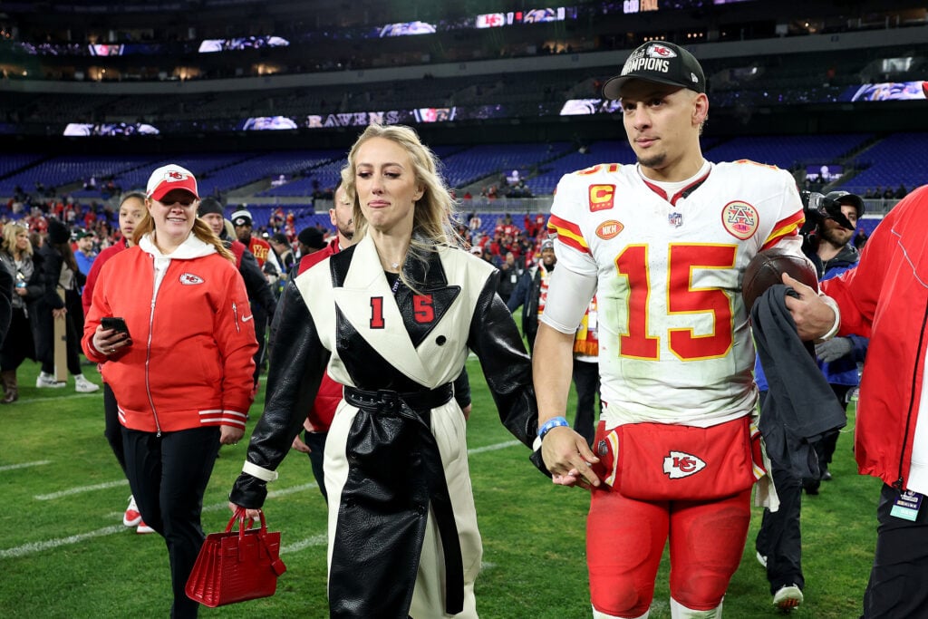 Patrick Mahomes #15 of the Kansas City Chiefs celebrates with his wife, Brittany, after a 17-10 victory against the Baltimore Ravens in the AFC Championship Game at M&T Bank Stadium on January 28, 2024 in Baltimore, Maryland.