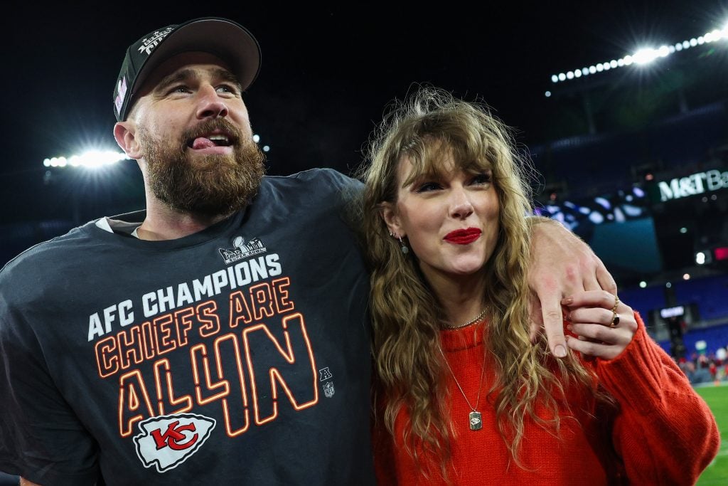 Travis Kelce #87 of the Kansas City Chiefs celebrates with Taylor Swift after defeating the Baltimore Ravens in the AFC Championship Game at M&T Bank Stadium on January 28, 2024 in Baltimore, Maryland.