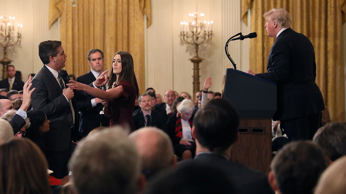 CNN's Jim Acosta questions U.S. President Donald Trump during his news conference following Tuesday's midterm U.S. congressional elections at the White House in Washington, U.S., November 7, 2018. REUTERS/Jonathan Ernst - RC189F0AFAA0