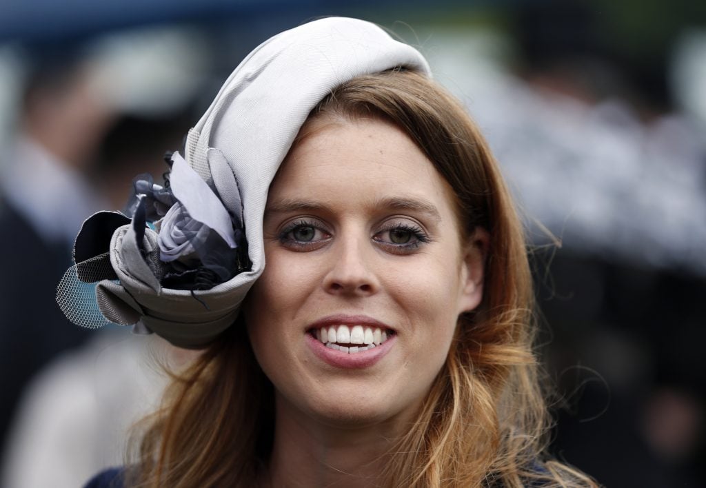 Princess Beatrice smiles during a garden party held at Buckingham Palace, on May 30, 2013 in London, England. 