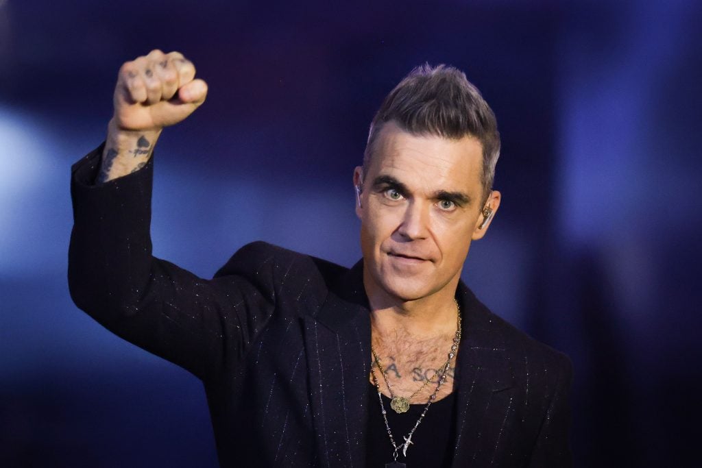 Robbie Williams performs on stage during the 