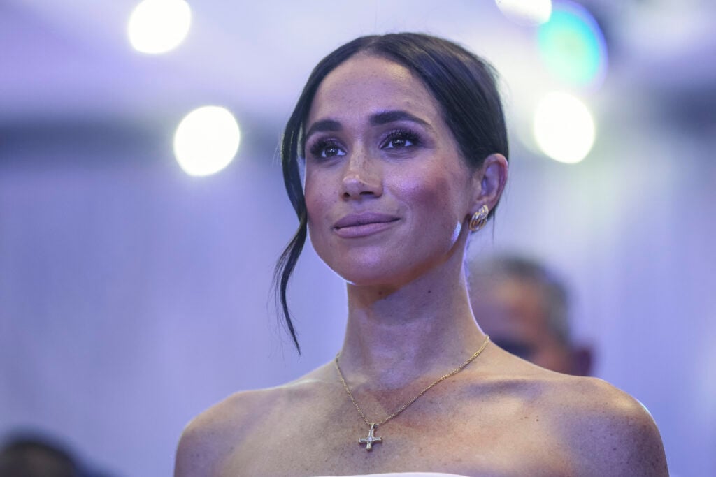 Britain's Meghan, Duchess of Sussex, looks on as she attends a Sit Out with Britain's Prince Harry (unseen), Duke of Sussex, at the Nigerian Defence Headquarters in Abuja on May 11, 2024 as they visit Nigeria as part of celebrations of Invictus Games anniversary.