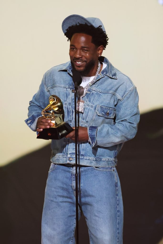 Kendrick Lamar accepts the Record of the Year award for 