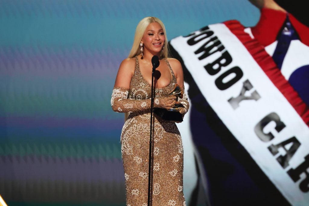 BeyoncÃ© accepts the Album of the Year award for 