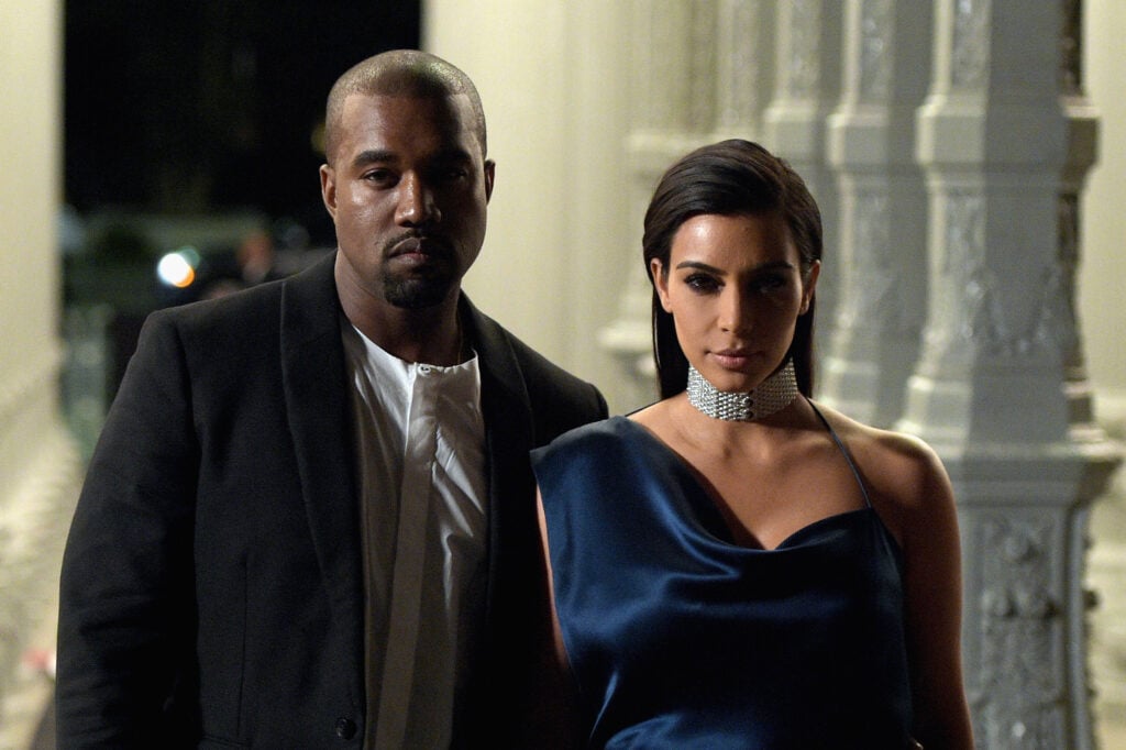 Recording artist Kanye West and TV personality Kim Kardashian attend the 2014 LACMA Art + Film Gala honoring Barbara Kruger and Quentin Tarantino presented by Gucci at LACMA on November 1, 2014 in Los Angeles, California.