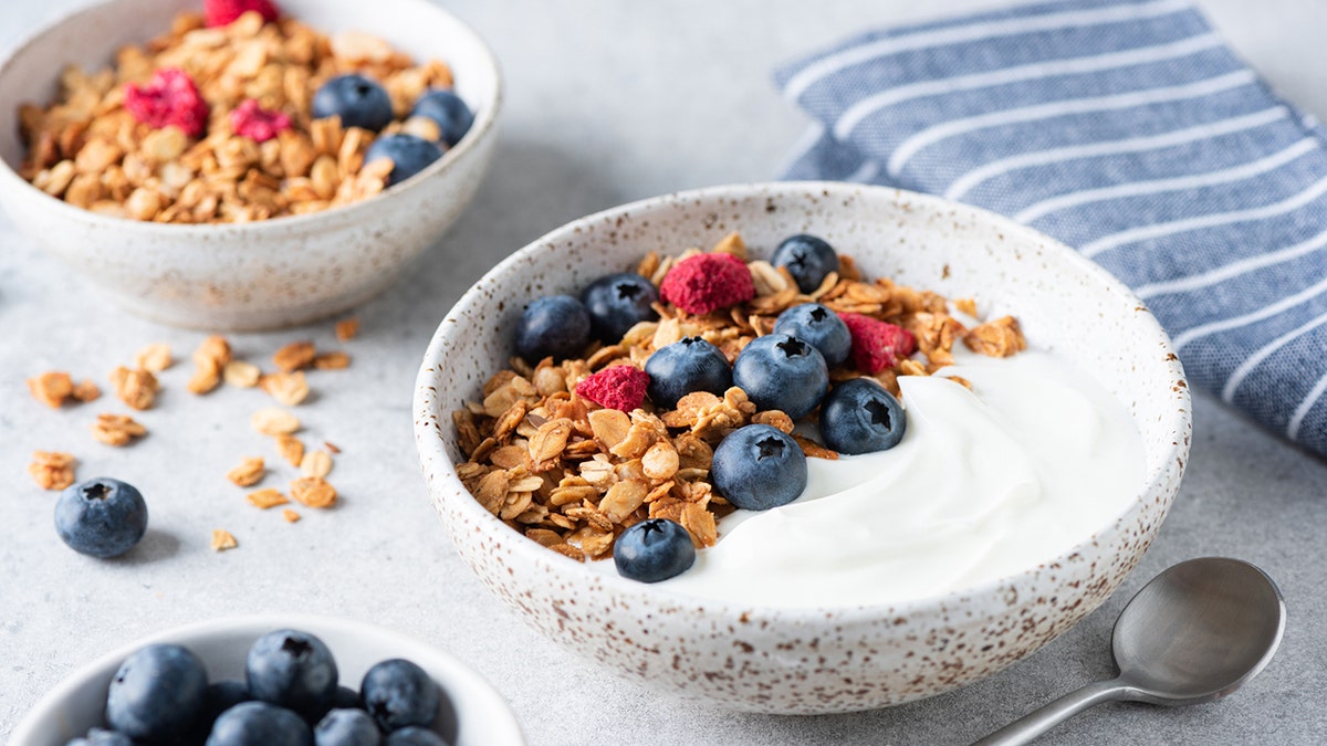 Yogurt with granola and fruit.