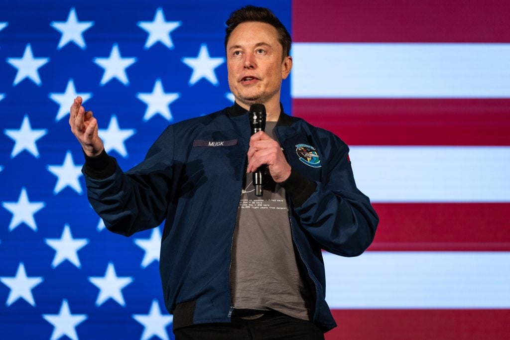 SpaceX and Tesla founder Elon Musk speaks during an America PAC town hall on October 26, 2024 in Lancaster, Pennsylvania.