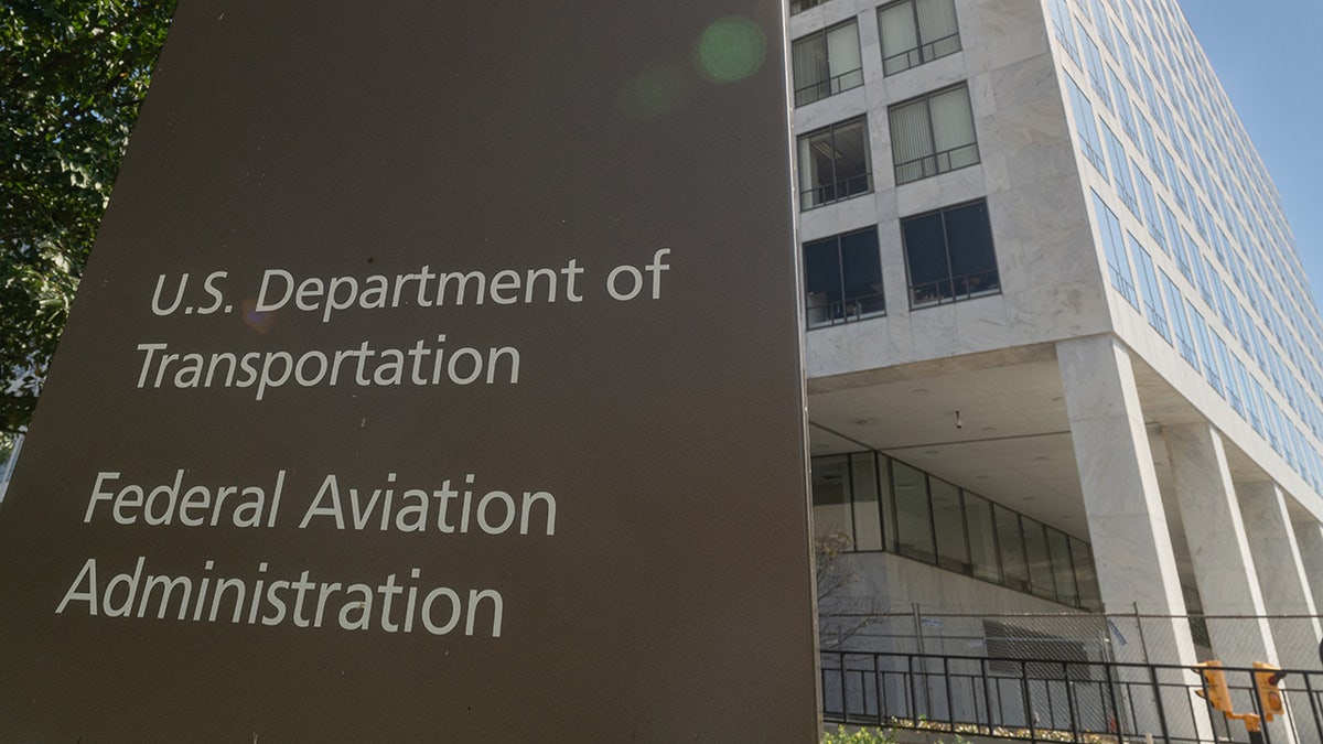 A sign marks the entrance to the FAA headquarters