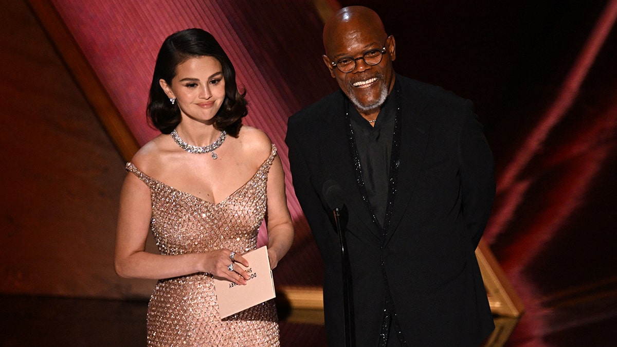 Selena Gomez and Samuel L. Jackson presenting at the Oscars.