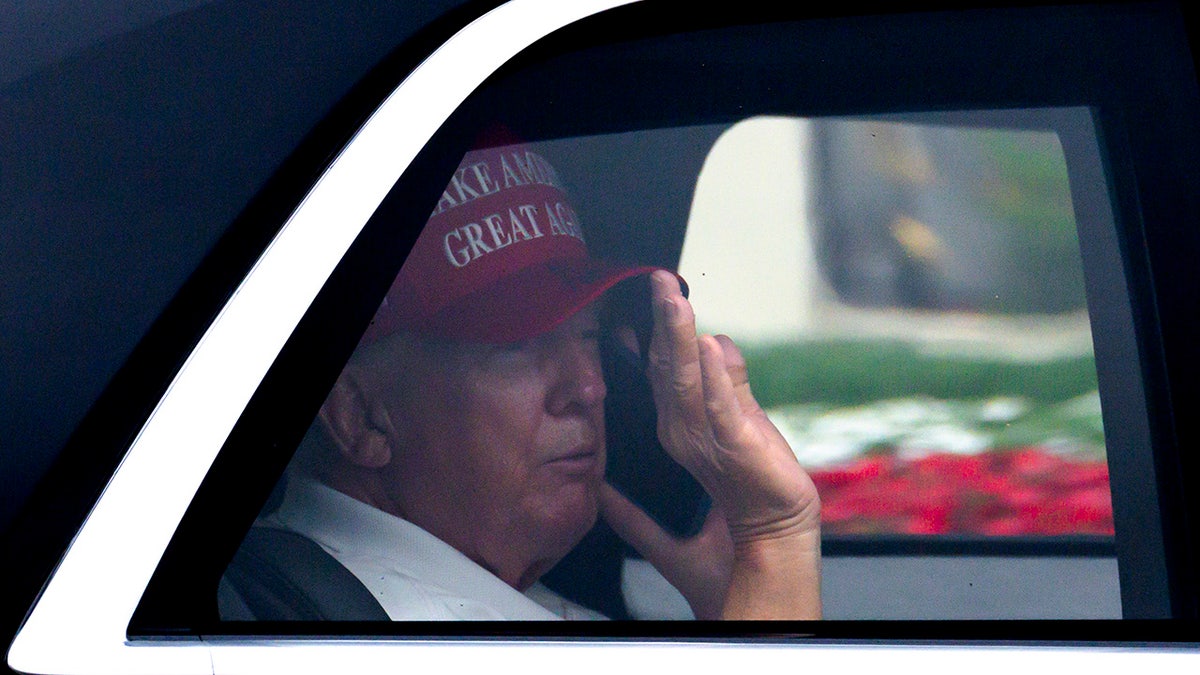 Donald Trump waves to supporters