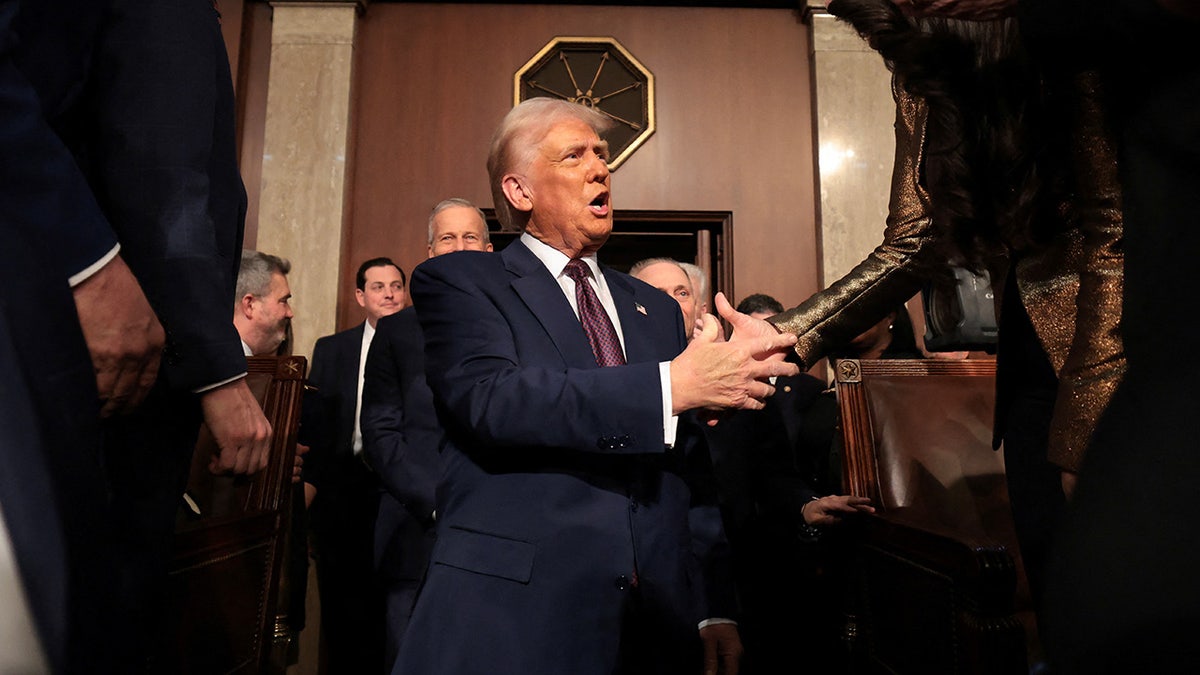 WASHINGTON, DC - MARCH 04: U.S. President Donald Trump enters the U.S. House chamber before he addresses a joint session of Congress at the U.S. Capitol on March 04, 2025 in Washington, DC.     Win McNamee/Pool via REUTERS