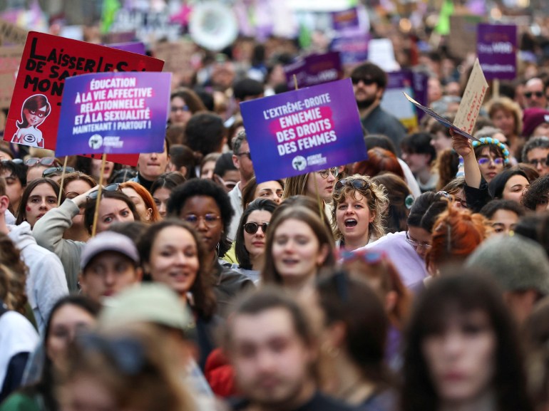 People attend a demonstration to call for gender equality and demand an end to violence against women to mark International Women's Day in Paris, France, March 8, 2025. REUTERS/Gonzalo Fuentes