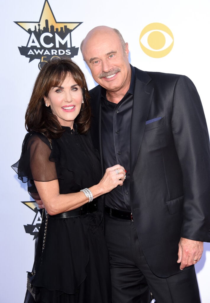 Robin McGraw and TV personality Phil McGraw attend the 50th Academy of Country Music Awards at AT&T Stadium on April 19, 2015 in Arlington, Texas. 