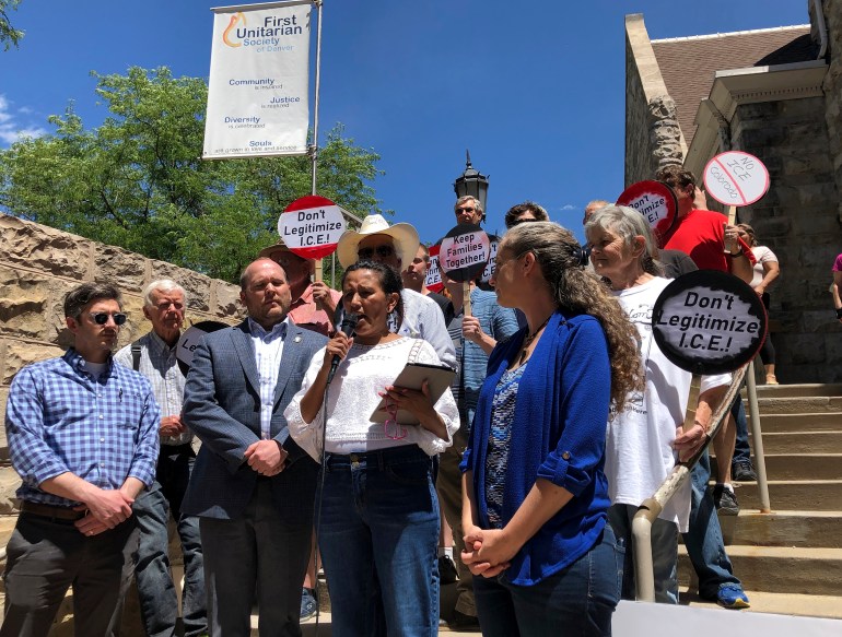 Jeanette Vizguerra, an immigration activist who has fought deportation to Mexico, surrounded by supporters, speaks outside the Denver church where she has sought sanctuary in Denver, Colo., Thursday, June 19, 2019. Vizguerra says federal authorities have denied her latest petition to stay in the U.S. She will continue her fight while living in the First Unitarian Society of Denver church to avoid deportation to her native Mexico. Vizguerra has lived in the United States since 1997. She has three U.S.-born children. Her attorney says he's appealing the decision.