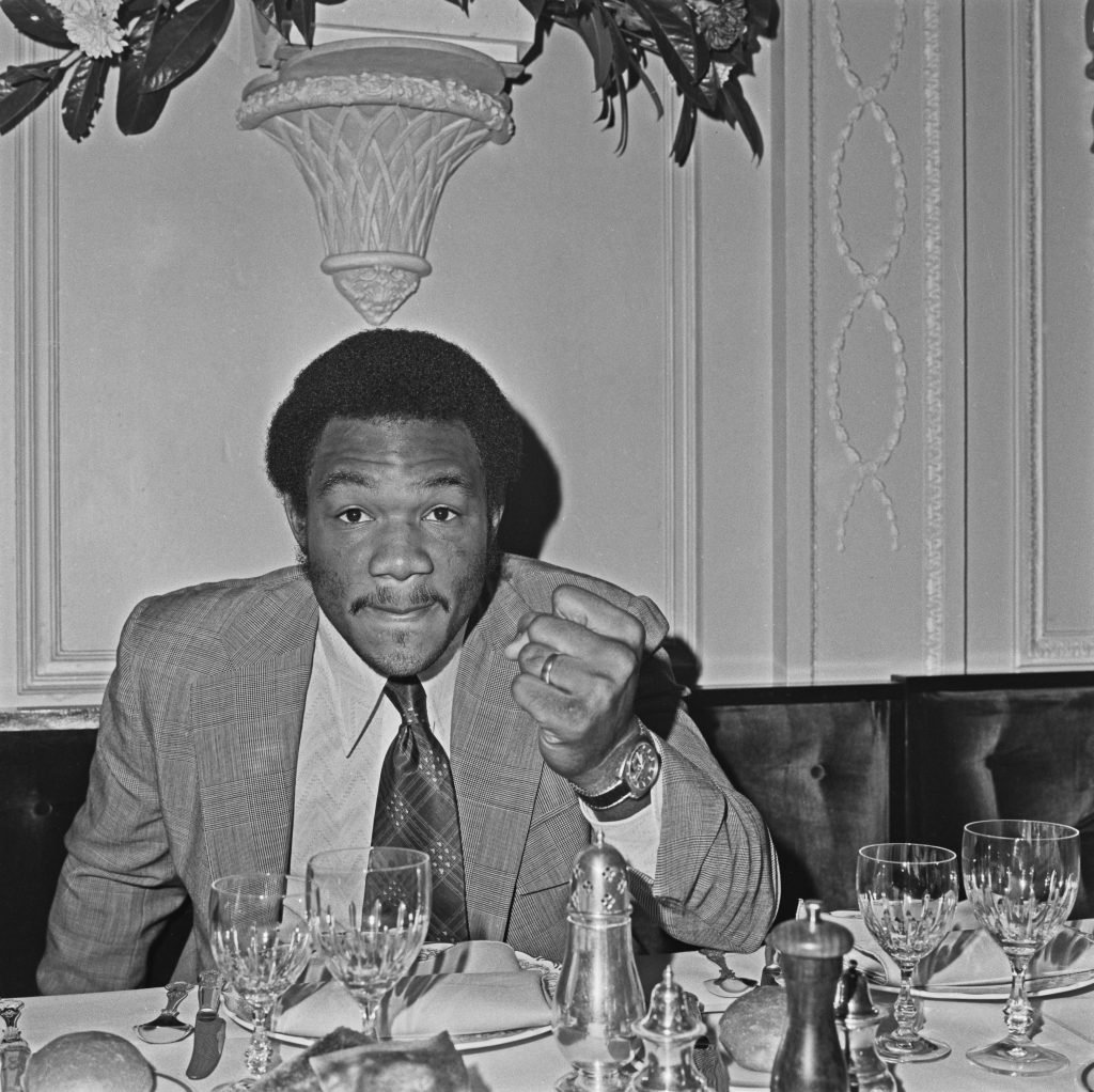 American heavyweight boxer George Foreman, the world heavyweight champion, holds a press conference in London on the first stage of his European tour, UK, 12th March 1973. 