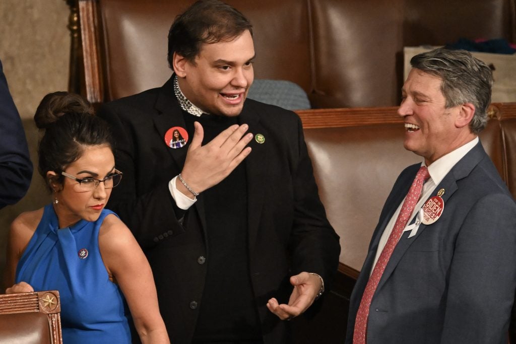 George Santos and a couple of fans in March of 2024.